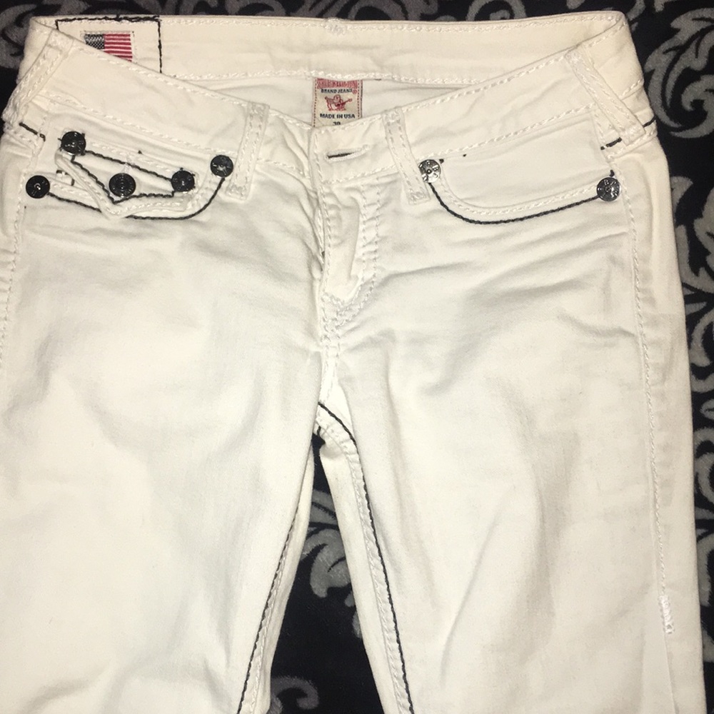 White jeans with black stitching